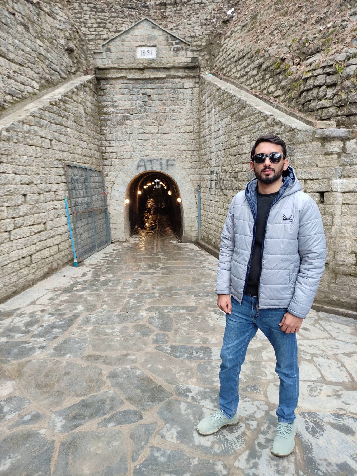 The old stone tunnel on the ridge trail, dated 1891 above the archway.